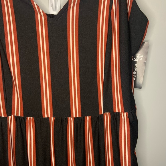 3/20$ Large jump suit from Giant Tiger. Can’t return. NWT. - Picture 2 of 4